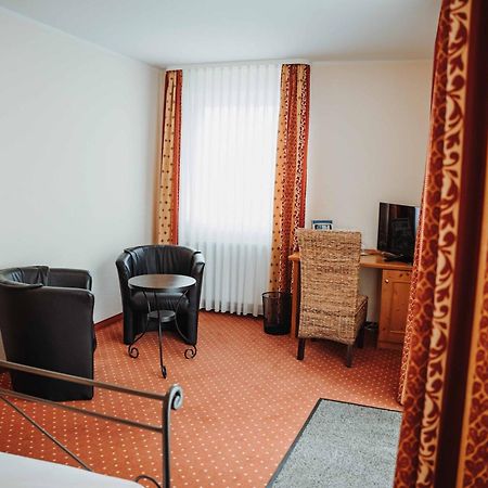 Hotel Am Wallgraben Брілон Номер фото